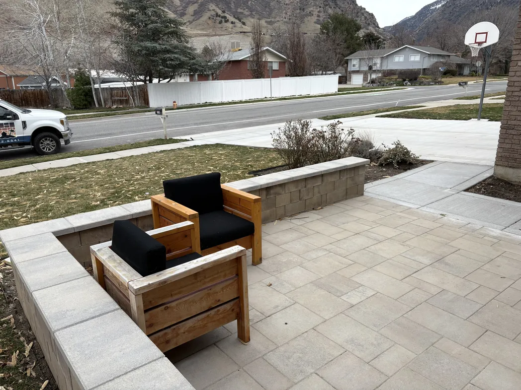 Outdoor seating on a paver patio showing furniture layout