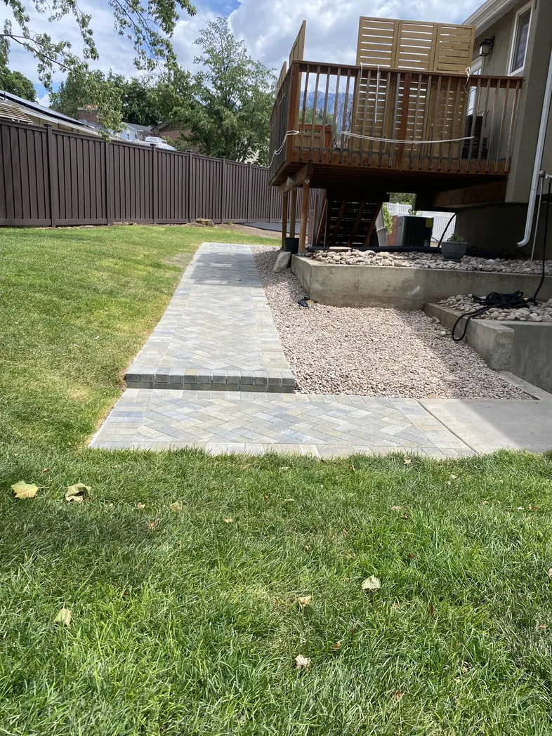 Residential paver walkway with clean border detail installed by Aloha Pavers & Concrete